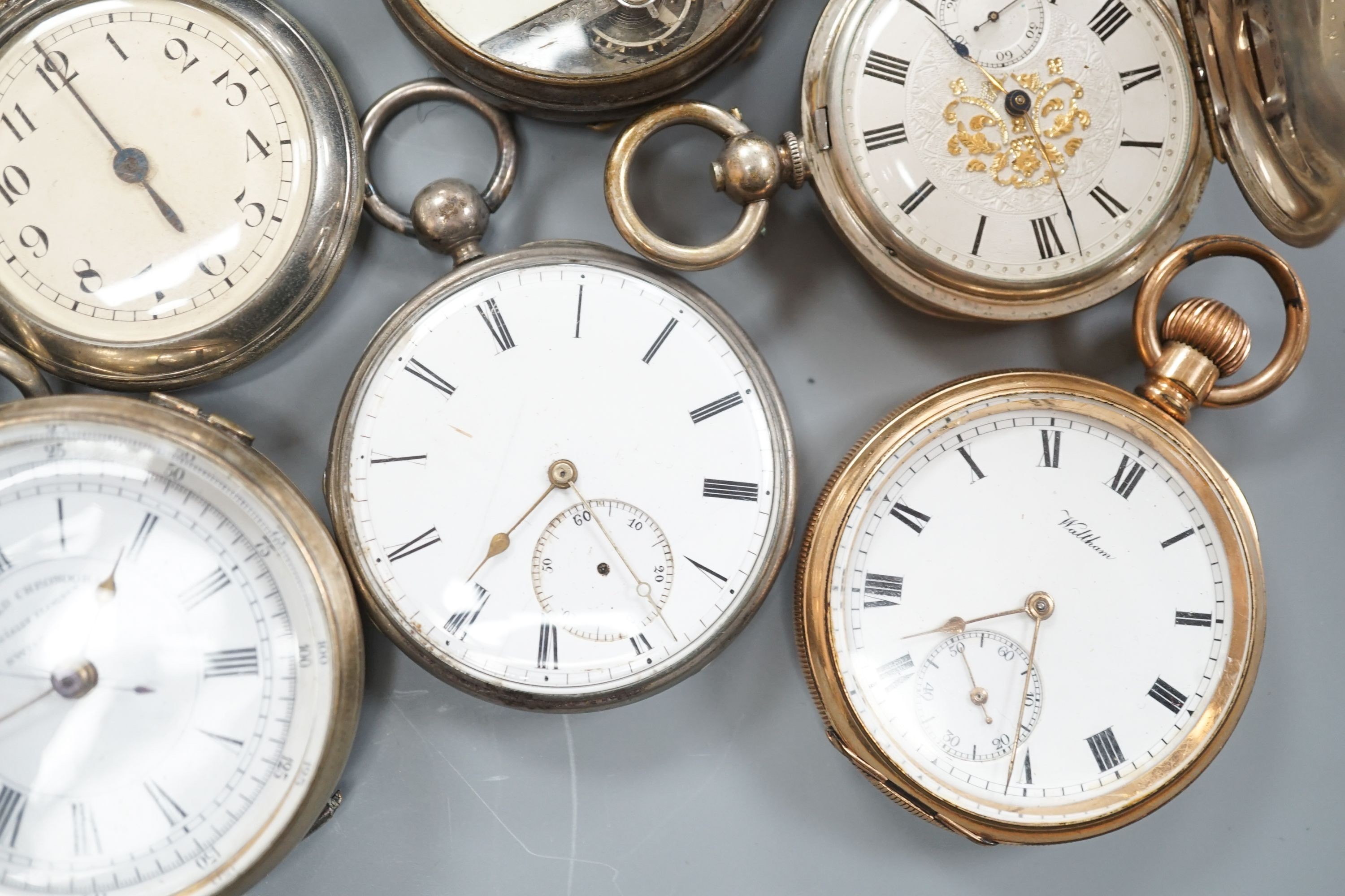 A small collection of assorted base metal and gold plated pocket watches including Hebdomas and Waltham and a small quantity of watch parts.